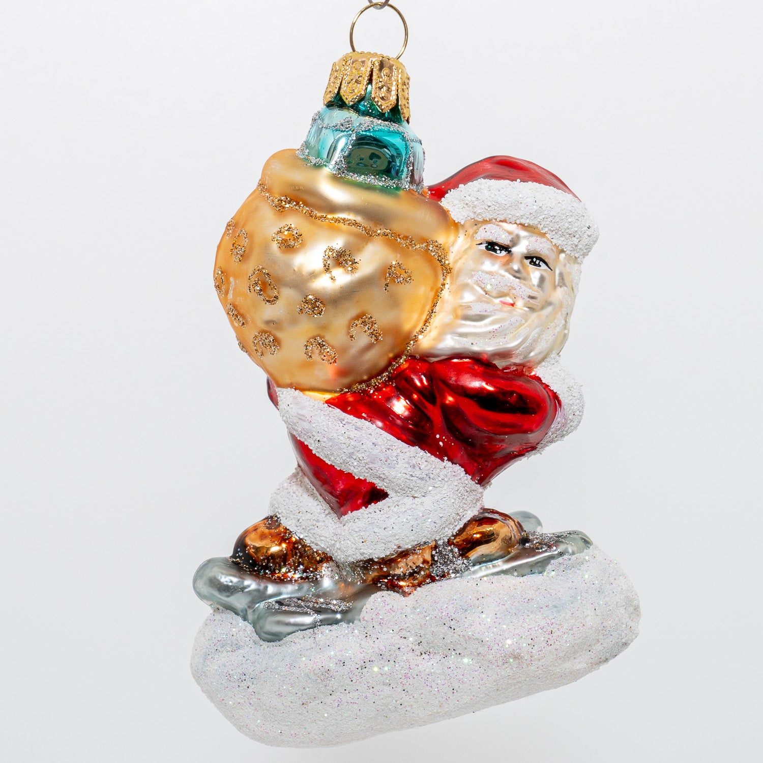 Julemand på ski med sæk