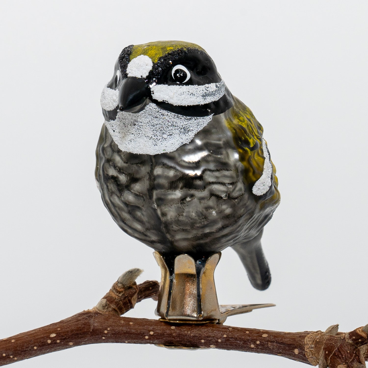 Gul/sort fugl på klips