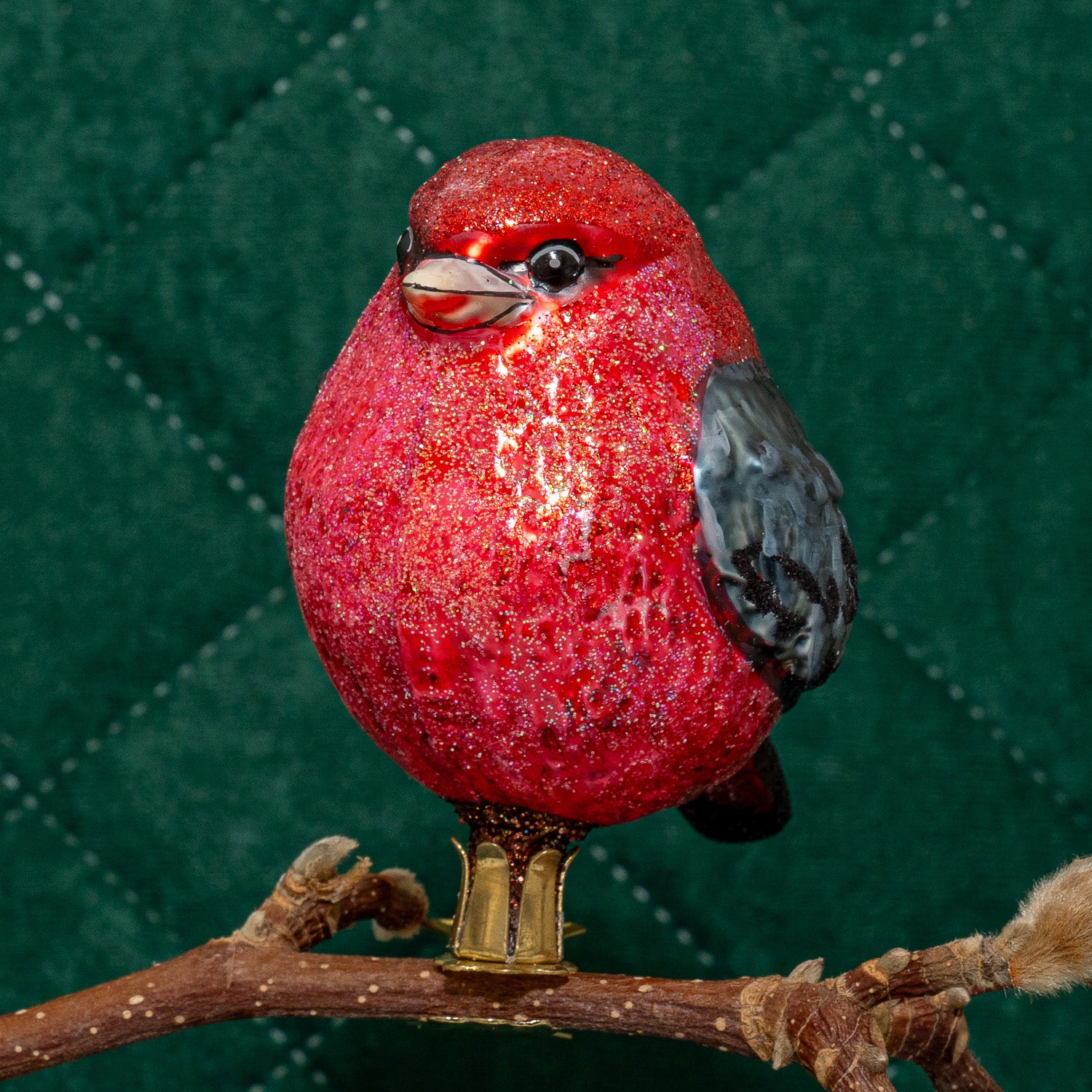 Rød/sort fugl på klips
